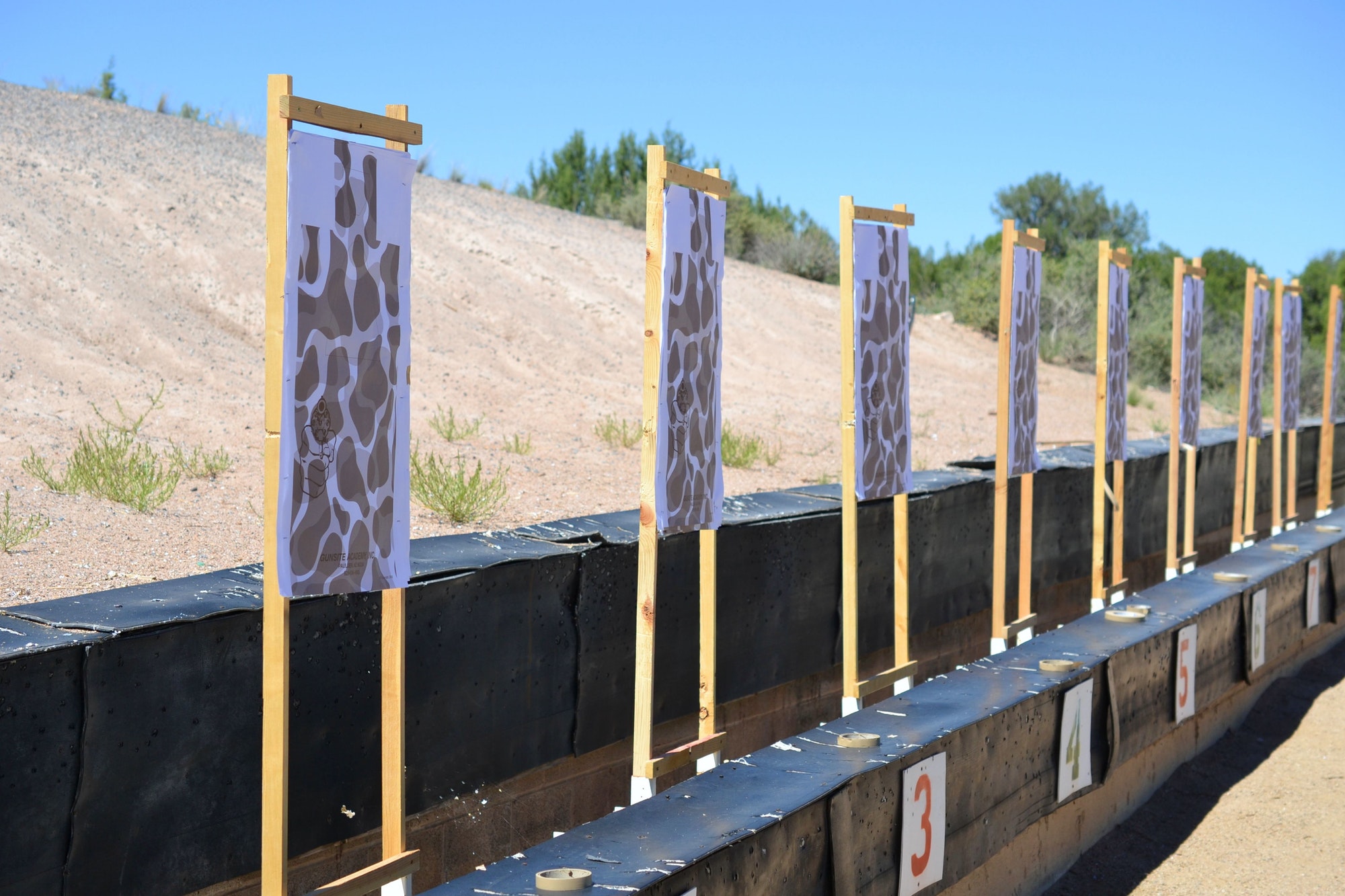 Paper targets at a gun range for target practice and firearms training