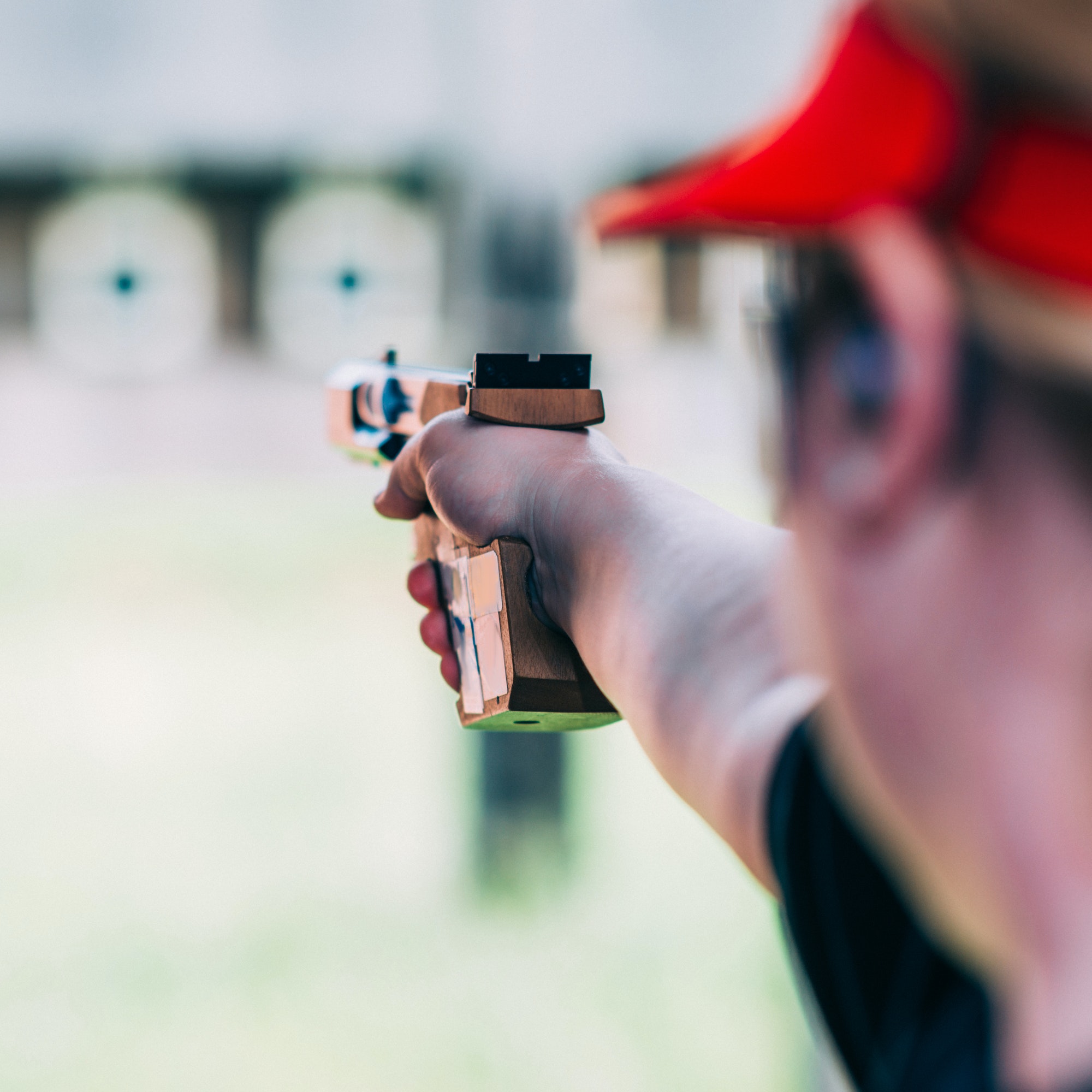 Woman on sport shooting training shooting target